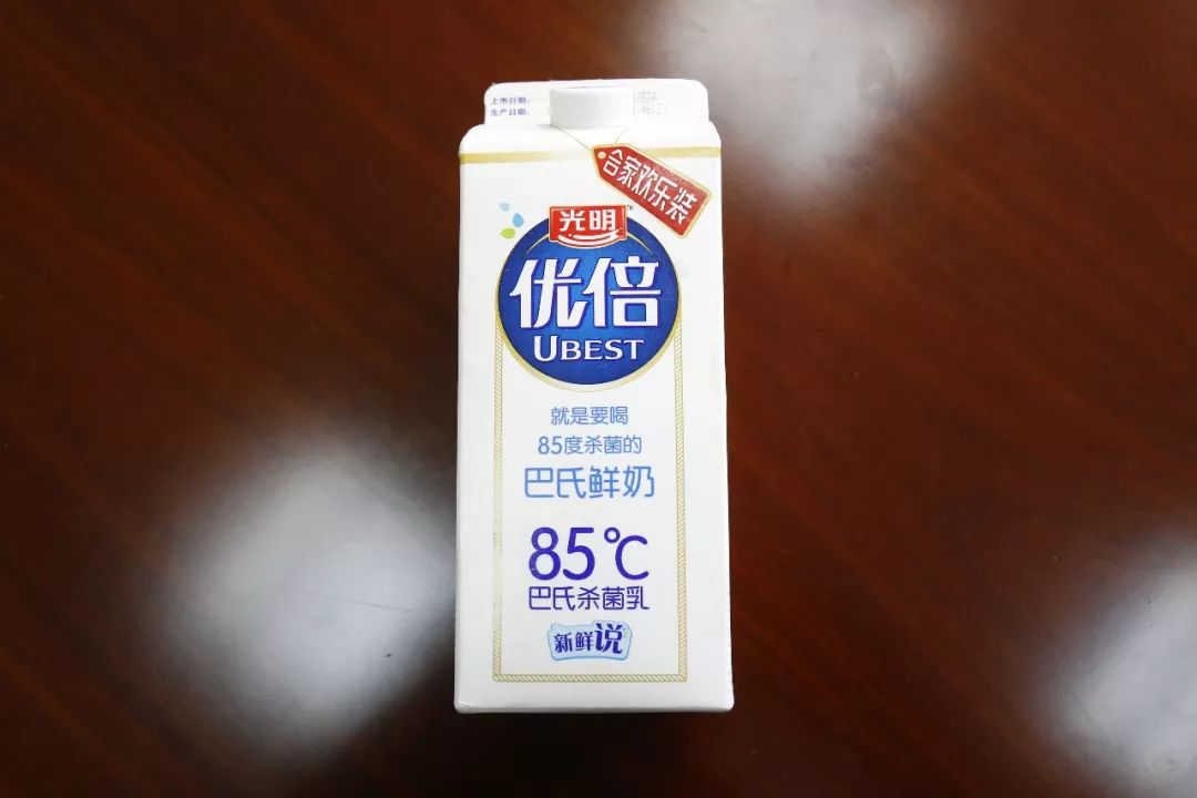 光明牛奶包裝盒上標識“85℃”是否侵權85度C品牌的商標權？