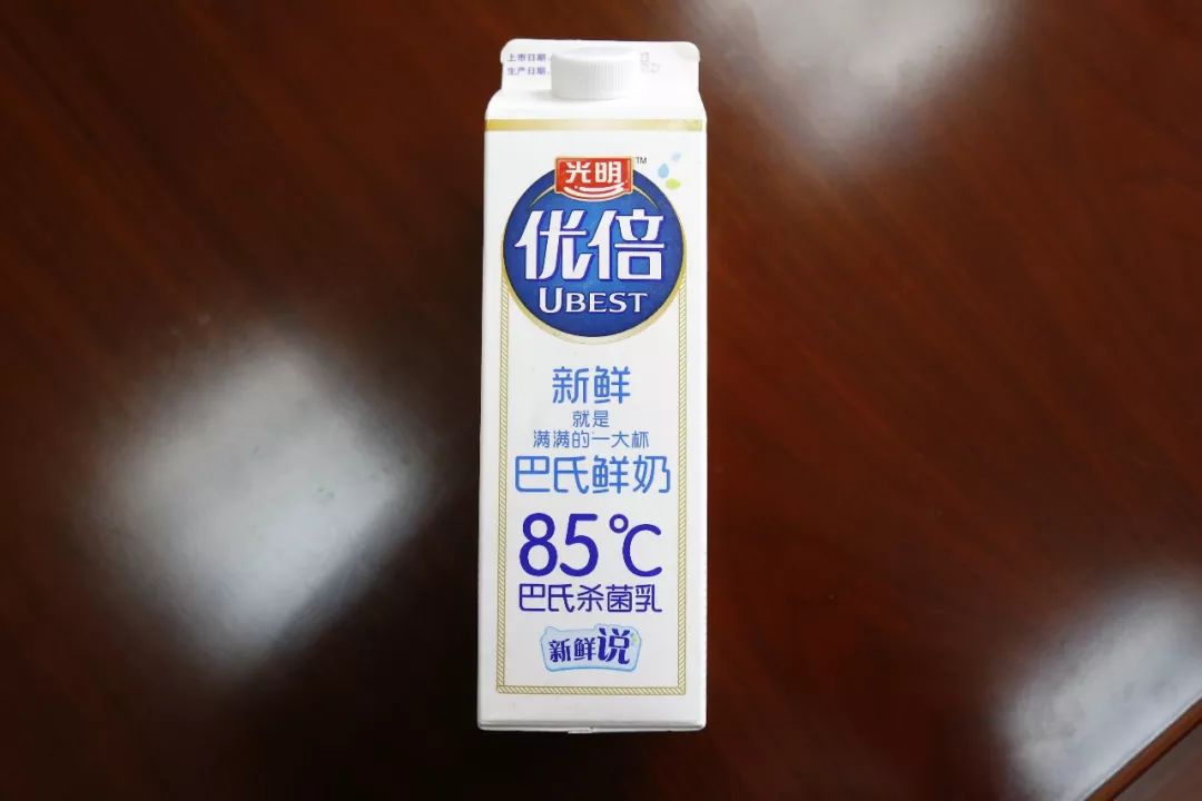 光明牛奶包裝盒上標識“85℃”是否侵權85度C品牌的商標權？